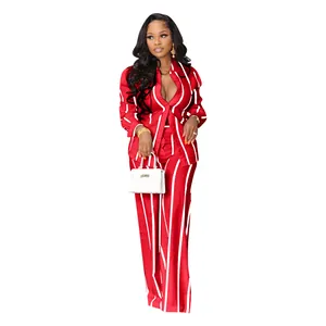Detail of red and white striped two-piece set with long sleeve shirt and trousers