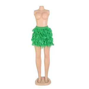 Front view of a vibrant green turkey feather mini skirt displayed on a professional mannequin
