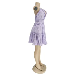 Side view of a lavender ruffle mini babydoll dress on a mannequin showing layered details.