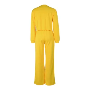 Back view of bright yellow two-piece women's sweatshirt and wide-leg pants lounge set