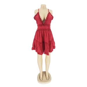 Sexy red sleeveless backless mini dress with ruffled deep V-neckline on mannequin.