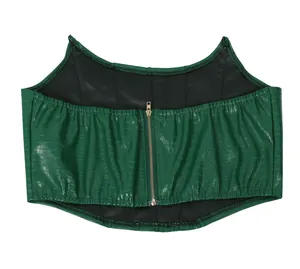 Detailed view of the green crocodile texture PU leather crop top with back zipper.