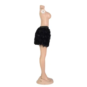 Side view of a stylish and sexy black turkey feather mini skirt for women's party wear