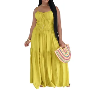 Sleeveless bohemian yellow tiered maxi dress for summer featuring a smocked bodice