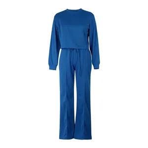 Blue two-piece lounge set with long-sleeved sweatshirt and wide-leg drawstring pants.