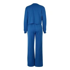 Back view of a solid blue two-piece long sleeve sweatshirt and wide-leg pants lounge set