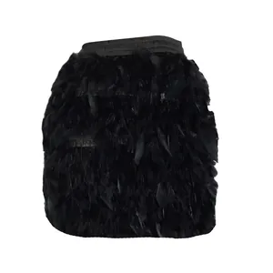 Macro view showing the soft texture of premium black turkey feathers on a party skirt