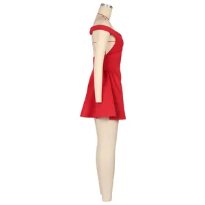 Side view of a vibrant red puffy mini dress on a mannequin for party and nightclub wear.