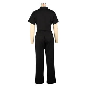 Back view of a chic black short-sleeved shirt and wide-leg pants two-piece set for women.
