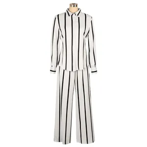Detailed front view of women's two-piece set featuring vertical black and white stripes