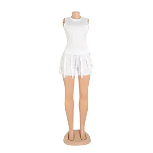 White two-piece set featuring sleeveless tank top and matching fringe detail shorts.