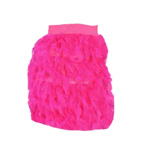 Close-up detail of hot pink turkey feather mini skirt with fluffy texture for party
