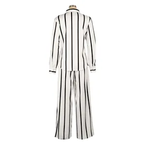 Back view of a white and black vertical striped long-sleeve shirt and wide-leg trousers set