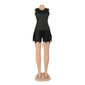 Full view of black two-piece set with sleeveless tank top and decorative fringe shorts