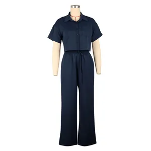 Navy blue linen-look two-piece set with short-sleeve shirt and wide-leg drawstring pants.