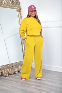 Stylish women's yellow casual sweatshirt set with wide-leg pants and thick fabric