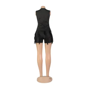 Back view of black two-piece set featuring sleeveless vest and fringe detail shorts.