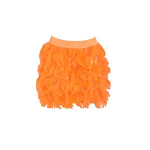 Detailed view of vibrant orange turkey feather mini skirt with fluffy layered texture