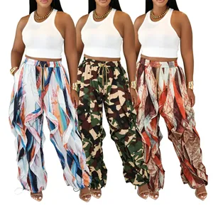 Women's wide-leg casual pants featuring colorful prints and ruffle pleated details