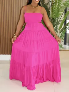 Detailed view of fuchsia sleeveless tiered maxi dress with smocked bodice