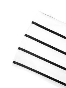 Close-up detail of black and white horizontal striped shirt fabric with neat stitching