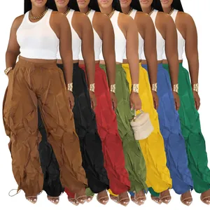 Collection of women's ruched wide-leg trousers in seven vibrant colors shown together