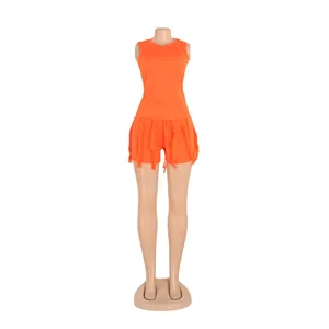 Vibrant orange two-piece summer set with sleeveless tank top and fringe detail shorts