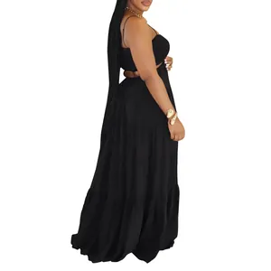 Detail view of black bohemian tiered maxi dress with sleeveless side cutout design