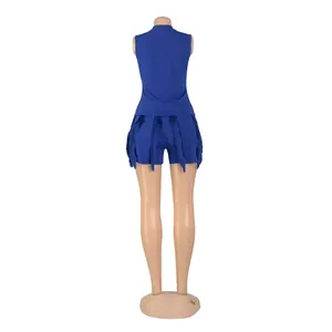 Back view of a royal blue two-piece set featuring a sleeveless top and fringed shorts