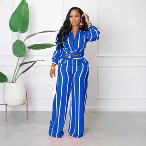 Stylish blue and white vertical striped long sleeve shirt and wide-leg pants set for women