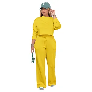 Detailed full view of women's yellow two-piece casual sweatshirt and wide-leg sweatpants set