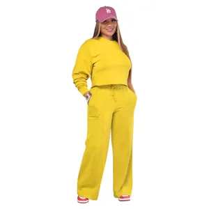 Full view of women's thick yellow two-piece casual sweatshirt and wide-leg pants set