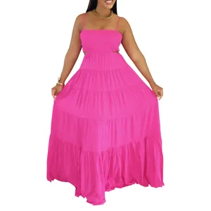 Detail view of pink bohemian tiered maxi dress with sleeveless spaghetti straps for summer.