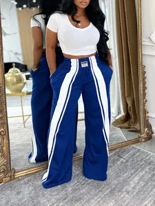 Pantalon décontracté large bleu tendance pour femme avec rayures blanches et taille élastique
