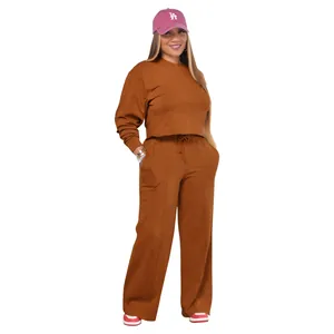 Comfortable women's brown two-piece tracksuit set with long sleeve top and wide-leg pants