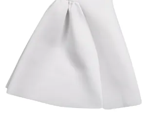 Detail view showing the high-quality white pleated puffy hemline of a sexy party dress