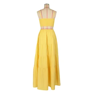 Detailed back view of a yellow Bohemian sleeveless tiered maxi dress on mannequin