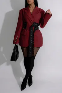 Burgundy women's blazer with black waist belt detail and elegant buttoned cuffs