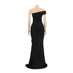 Detailed back view of an elegant black one-shoulder evening gown on a mannequin