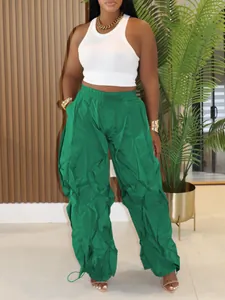 Oversized green pleated cargo pants for women with trendy ruched texture detail