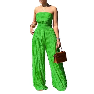 Tuta sexy verde senza spalline a gamba larga con trama plissettata per l'estate