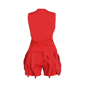 Back view of vibrant red sleeveless top and matching tassel fringe shorts two-piece set