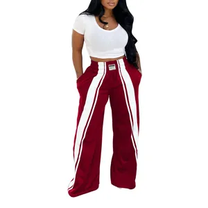 Pantalon de jogging femme bordeaux à jambes larges avec bandes blanches sur les côtés pour le style