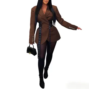Close-up of brown tailored blazer featuring side lace-up waist design and eyelet straps