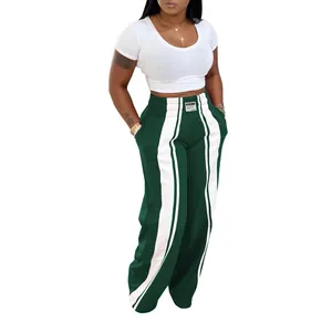 Pantalon large vert tendance pour femme avec rayures blanches latérales et taille haute