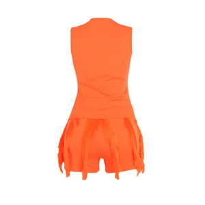 Detailed back view of orange summer two-piece set with vest and fringe lace shorts