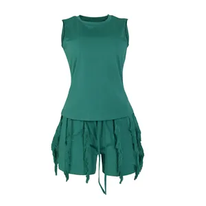 Trendy dark green two-piece summer set featuring sleeveless vest and fringe tassel shorts