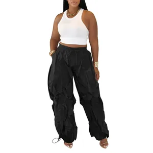 Stylish black pleated wide-leg casual pants for women with high waist drawstring detail