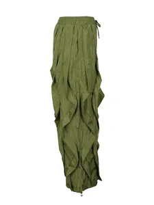 Side view detail of army green wide-leg pants with 3D ruffle pleats and drawstring waist