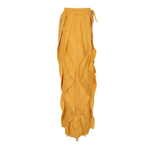 Unique yellow wide leg trousers featuring ruffled side panels and drawstring waist